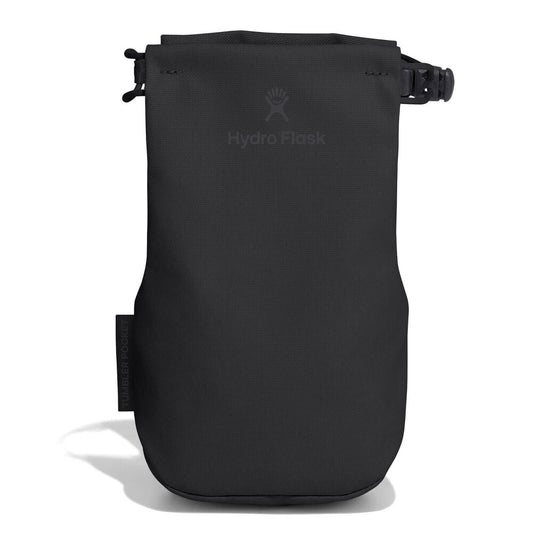 Black Hydro Flask accessory pouch with roll-top closure, side-release buckle, small loop, water-resistant material, logo on front, and "Tumbler Pocket" side tab.